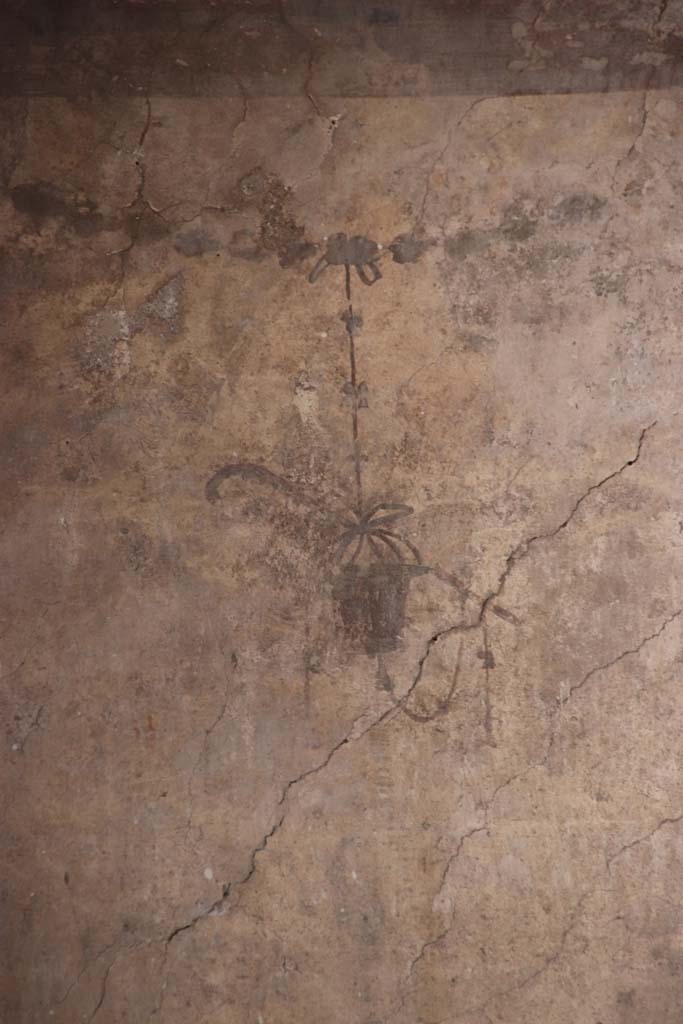 IV.21, Herculaneum. October 2020.
Room 24, detail of painted decorations, below Sphynx, from south end of upper west wall of atrium.
Photo courtesy of Klaus Heese.